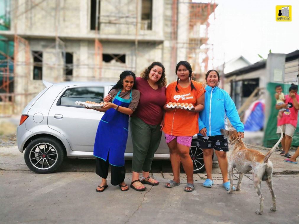A group of young girls posing for a photo.