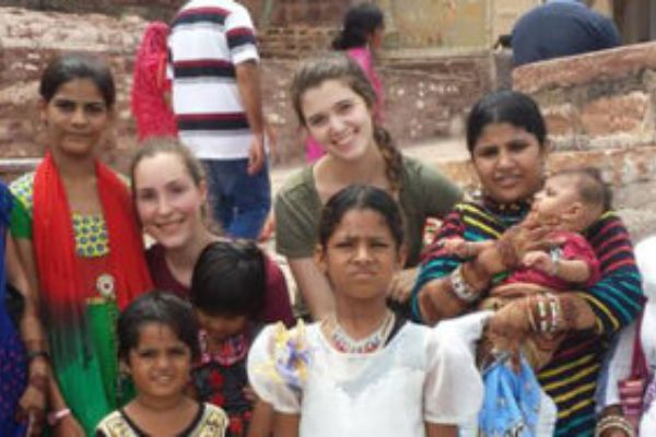 interns posing for a photo with local indian women