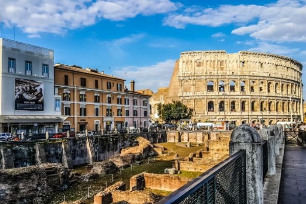 a landscape photo of The Colosseum in Rome, Italy