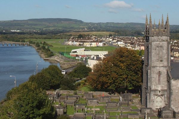 aerial shot of the lake and St. Munchin's Parish in Limerick, Ireland