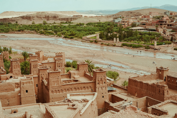 Morocco A bird’s eye view of the a historic Moroccan city with a dried up riverbend running through the middle